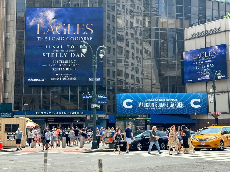 Madison Square Garden and Penn Station exterior with Eagles tour billboard