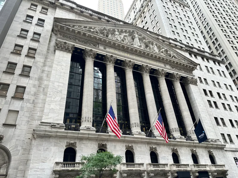 New York Stock Exchange building facade with American flags