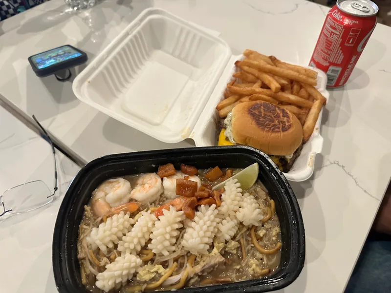 Singapore Hokkien Mee, burger, fries, and Coke from Urban Hawker